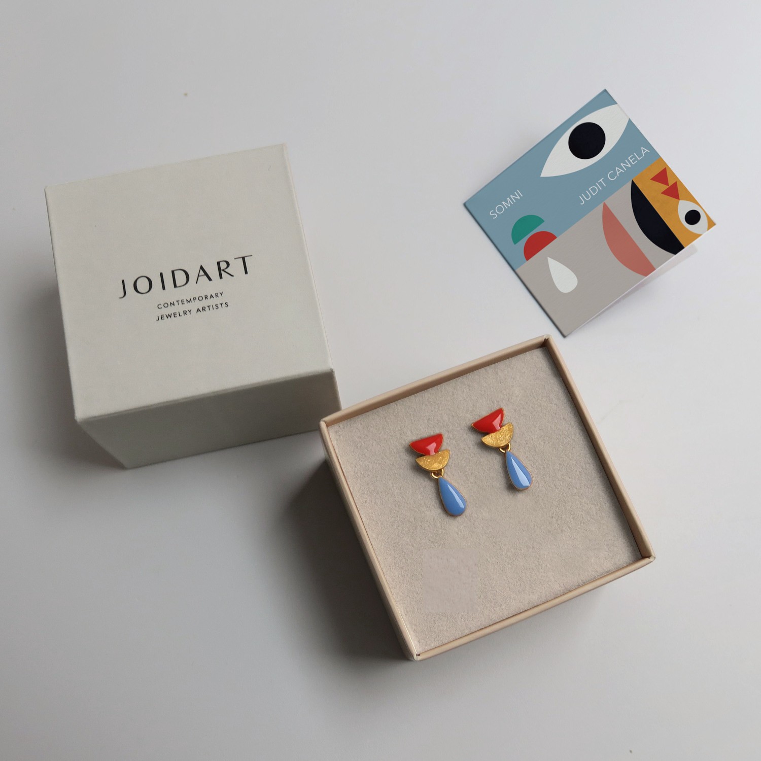 BOUCLES D'OREILLES ROUGE ET GOUTTE BLEUE SOMNI